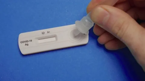Corona Fast self Test - Covid-19 Antigen Test negative (4K) Video stock 167073650