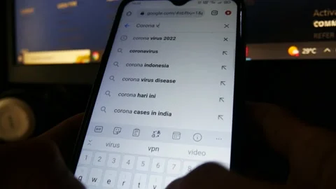 Corona virus August update Google search results on a modern smartphone Stock Footage 204783986