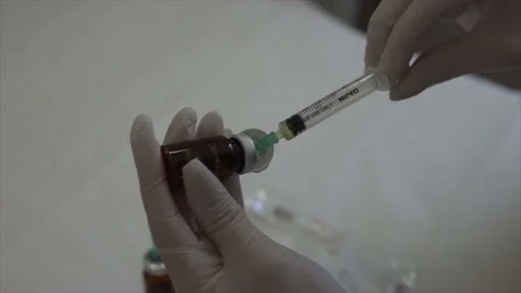 Corona Virus Outbreak - Scientist In A Lab Developing Coronavirus Vaccine Stock Footage 143774834