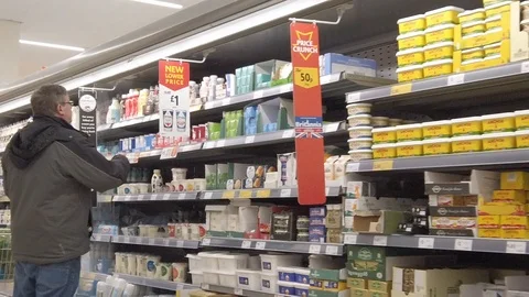 Corona virus panic buying slow motion shopping supermarket shelves people Stock Footage 126594776
