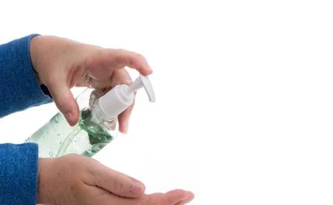 Corona Virus Protection. Hands using hand sanitizer gel pump dispenser. Healt Stock Photos