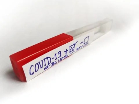 Corona Virus testing kit in hands on lab table Stock Photos