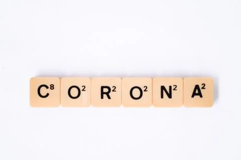 Corona word on rustic plastic tiles alphabet puzzle board game Stock Photos