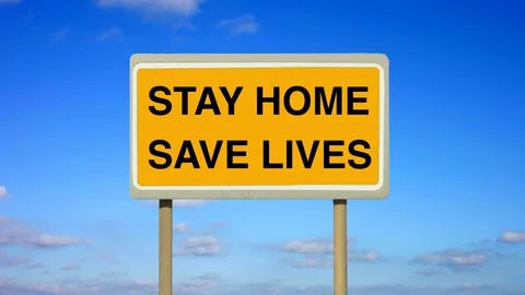 Coronavirus advice to stop the spread of infection. Stay Home Save Lives sign. Stock Footage 127682806