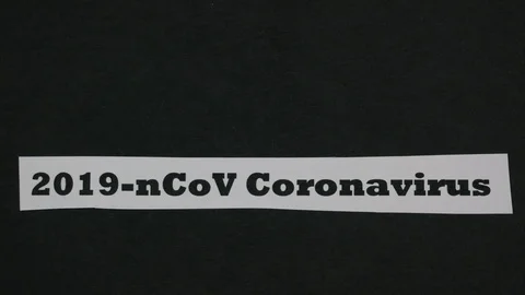 Coronavirus appears on a black background. Mutation of viruses concept Stock-Footage 125991502