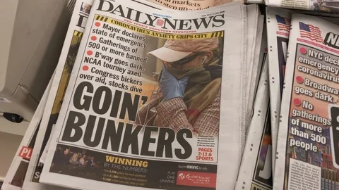Coronavirus causes massive closures. Newspapers front pages. 스톡 동영상 126325847