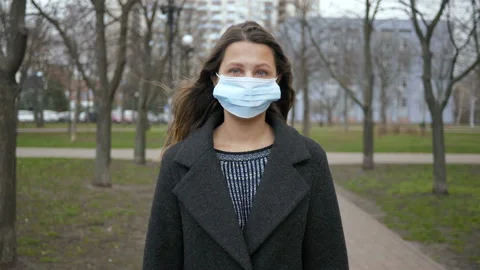 Coronavirus covid 19 pandemic mask woman people city Stock Footage