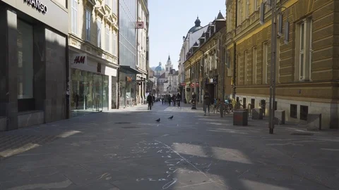 Coronavirus, empty streets with few people walking. Stock Footage 126575608