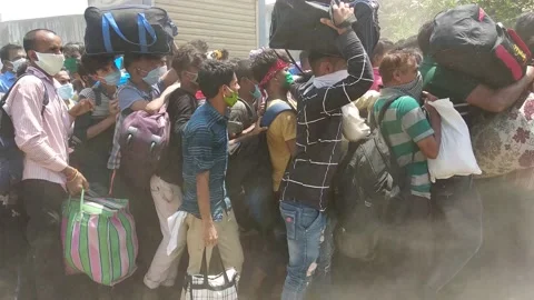 Coronavirus India lockdown Migrant workers at Bandra terminus Stock Footage 142691282