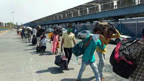Coronavirus India lockdown Migrant workers at Bandra terminus Stock Footage 142693208