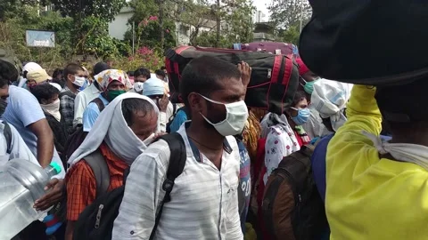 Coronavirus India lockdown Migrant workers in Mumbai Stock Footage 143054740