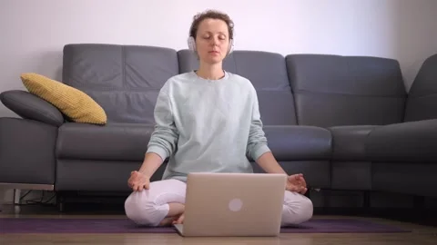 Coronavirus lockdown restrictions. Front view of Caucasian woman practicing Stock Footage 141682092