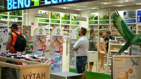 Coronavirus mask face operation of pharmacy dispensary interior people Video stock 134297802