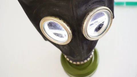 The coronavirus or Covid-19 on the eyeshield of the black hazard mask Stock Footage 129344779