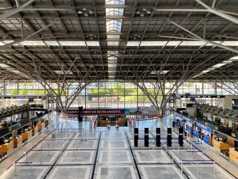 Coronavirus outbreak: Empty check-in desks at the airport terminal due to Stock Photos