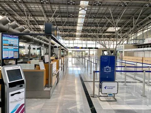 Coronavirus outbreak: Empty check-in desks at the airport terminal due to Stock Photos