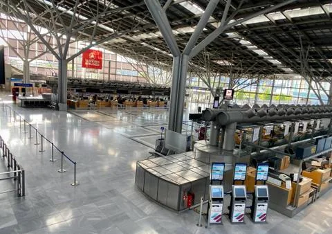 Coronavirus outbreak: Empty check-in desks at the airport terminal due to Stock Photos