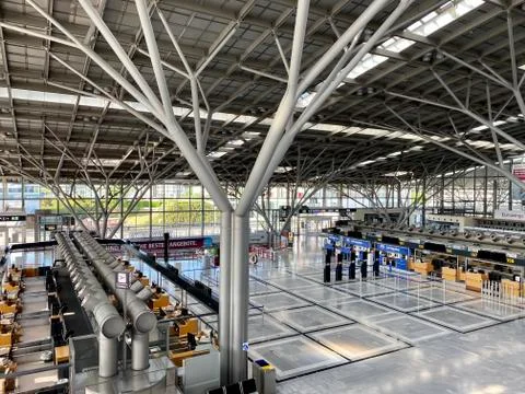 Coronavirus outbreak: Empty check-in desks at the airport terminal due to Stock Photos
