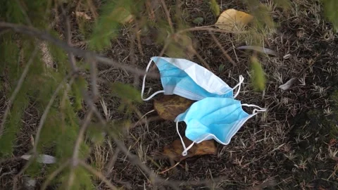The coronavirus outbreak is garbage in the forest, Park Stock Footage 142030976