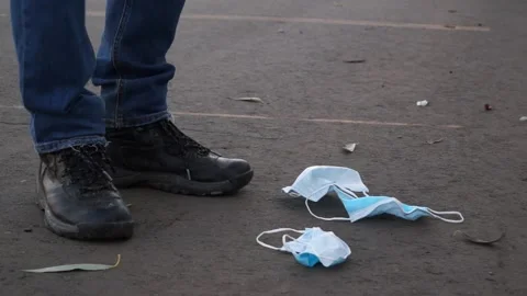 The coronavirus outbreak is garbage in the forest, Park. tidying up rubbish  Stock Footage 142164256