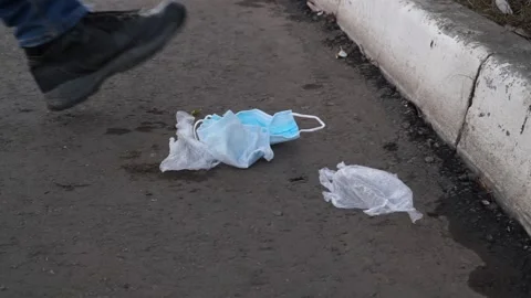 The coronavirus outbreak is garbage in the forest, Park. tidying up rubbish  Stock Footage 142164410