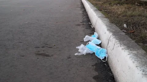 The coronavirus outbreak is garbage in the forest, Park. tidying up rubbish  Stock Footage 142164424