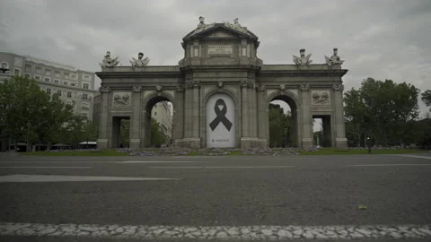 Coronavirus Outbreak in Spain: Empty Puerta de Alcala during lockdown Stock Footage 132631118
