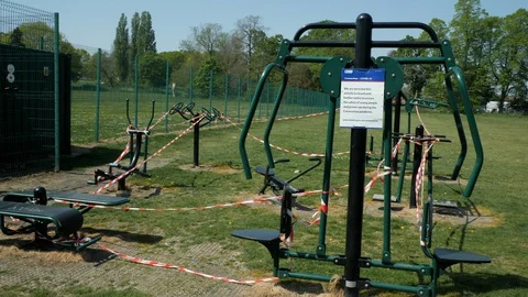 Coronavirus Outdoor Exercise Facilities Closed In London Park with Sign Wide Stock Footage 129550251