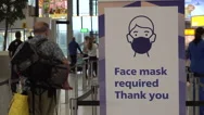 Coronavirus Pandemic And Global Travel Industry, Required Face Masks At Airport Stock Footage