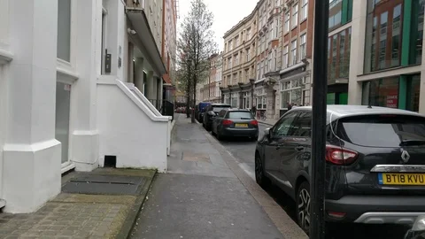 CORONAVIRUS PANDEMIC LEAVES SIDEWALKS EMPTY IN SOHO CENTRAL LONDON 4K Stock Footage 126661797