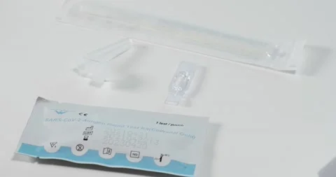 Coronavirus self test kit with nasal swab and testing cassette. Stock-Footage 155073279
