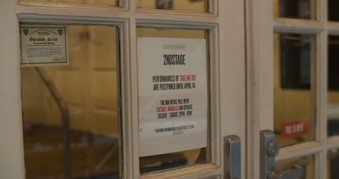 Coronavirus shuts down Broadway. Close up Notice on entrance. Take Me Out Stock Footage 126295970