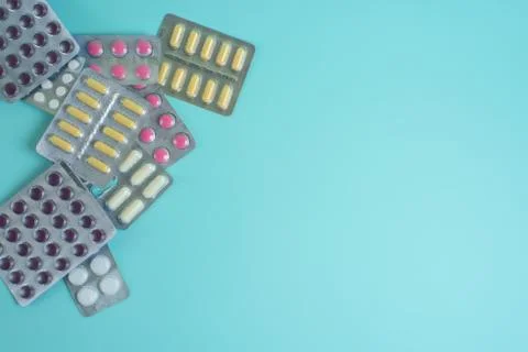 Coronavirus tablets top view. background image. capsules and tablets with bli Stock Photos