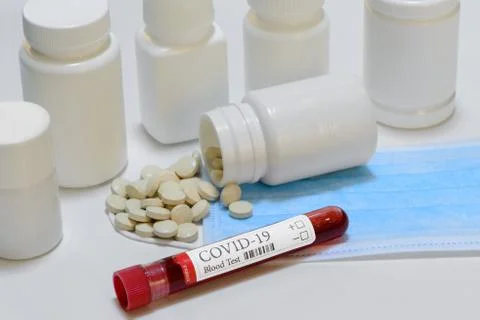 Coronavirus test laboratory sample of blood and medicines Stock Photos