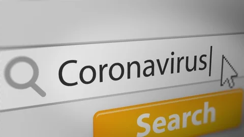 "Coronavirus" Typing into Search Engine on Computer Screen Stock Footage 129736081