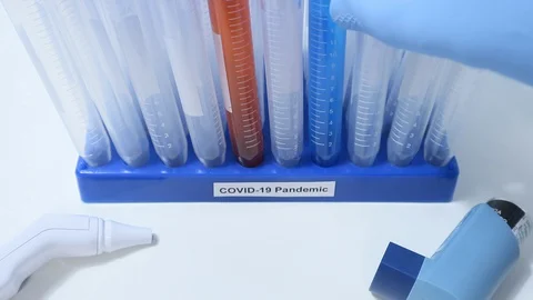 Coronavirus USA Testing on Front Lines Tungsten Lighting Blue Glove 動画素材 128155696