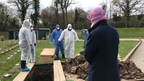 Coronavirus victim, 13, buried while mother and siblings self-isolate Stock Footage 148565900