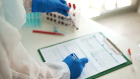 Coronovirus vaccine development. Laboratory studies of blood samples infected Stock Footage 129779535