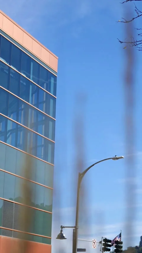 Corporate Building with Foreground Grass - Vertical Stock Footage 327429503
