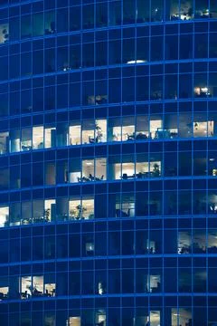 Corporate building at night Stock Photos