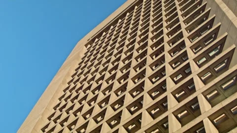Corporate building with squared brutalism pattern facade at Christian Science Stock Footage 302417300