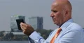 Corporate Business Person Outside Office Building Send Email Using Touchpad Web 4k or 4k+ Resolution