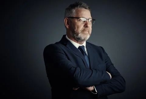 Corporate decisions cannot be made with haste. Studio shot of a handsome mature Foto stock