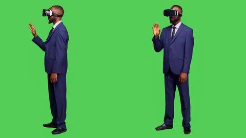 Corporate employee using vr headset on camera Stock Photos