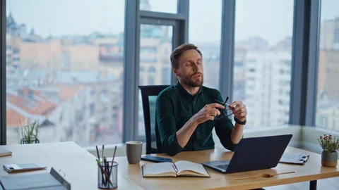 Corporate employee writing notebook sitting by office panoramic window closeup. Stock Footage 340296111