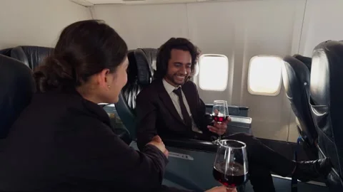 Corporate Executives Formal Conversation in flight Stock Footage 290417322