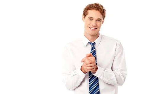 Corporate guy posing with clasped hands Stock Photos