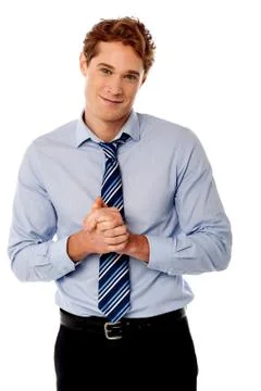 Corporate guy posing with clasped hands Stock Photos