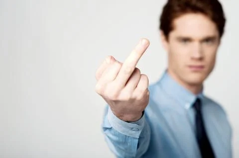 Corporate guy showing middle finger Stock Photos