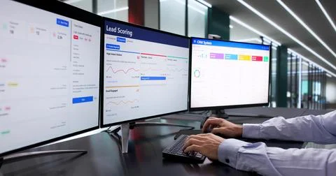 Corporate Man Using CRM Software To Streamline Lead Generation Process. Stock Photos